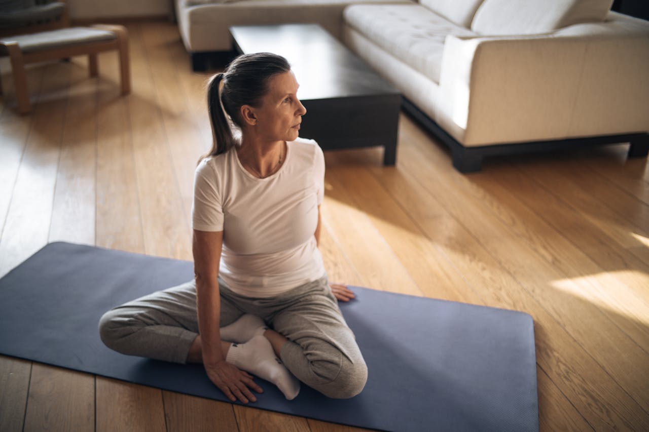 An Elderly Woman Doing a Yoga